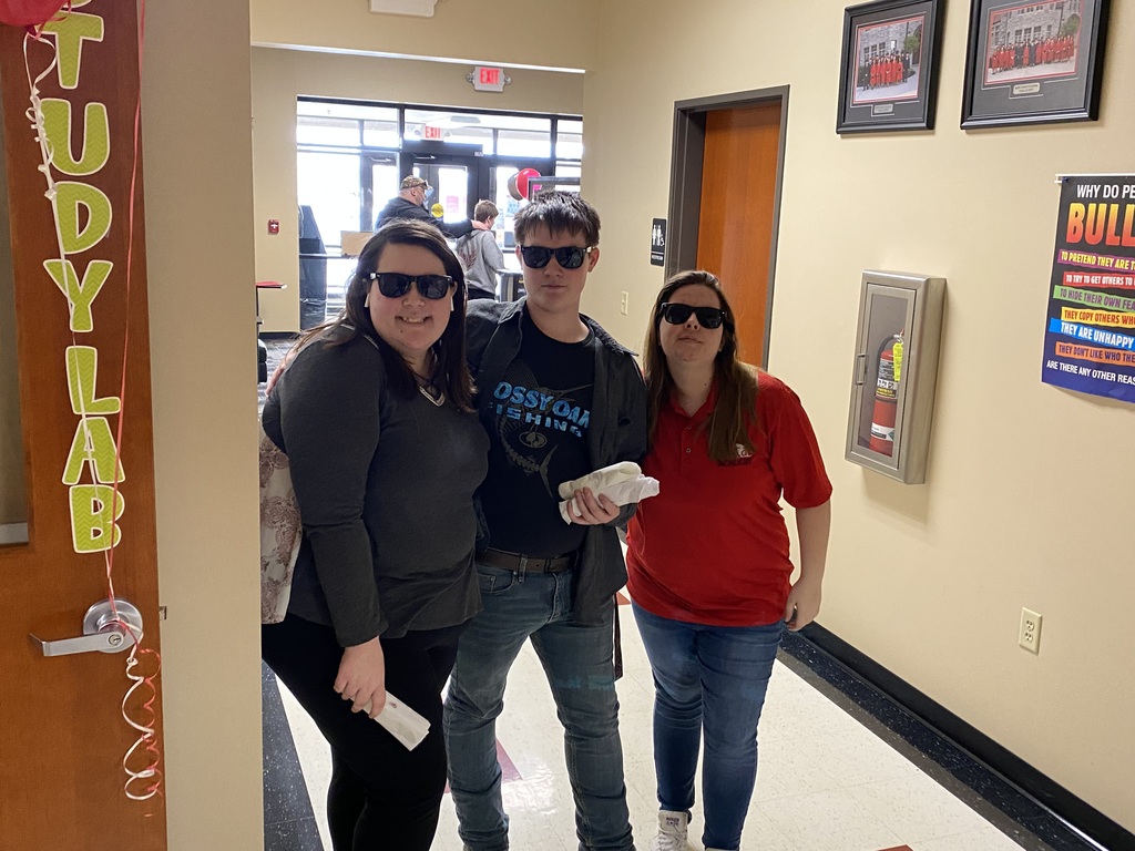 Students showing off their NCA sunglasses